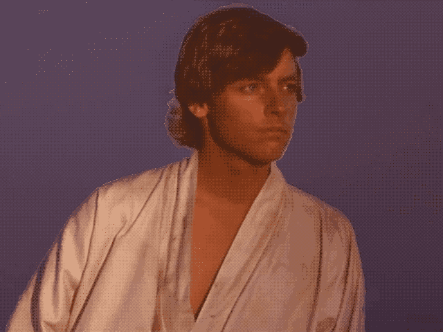 Luke looking wistfully out at the dual sunset on Tatooine as The Force Theme plays hauntingly in the background, beckoning him to his grand adventure